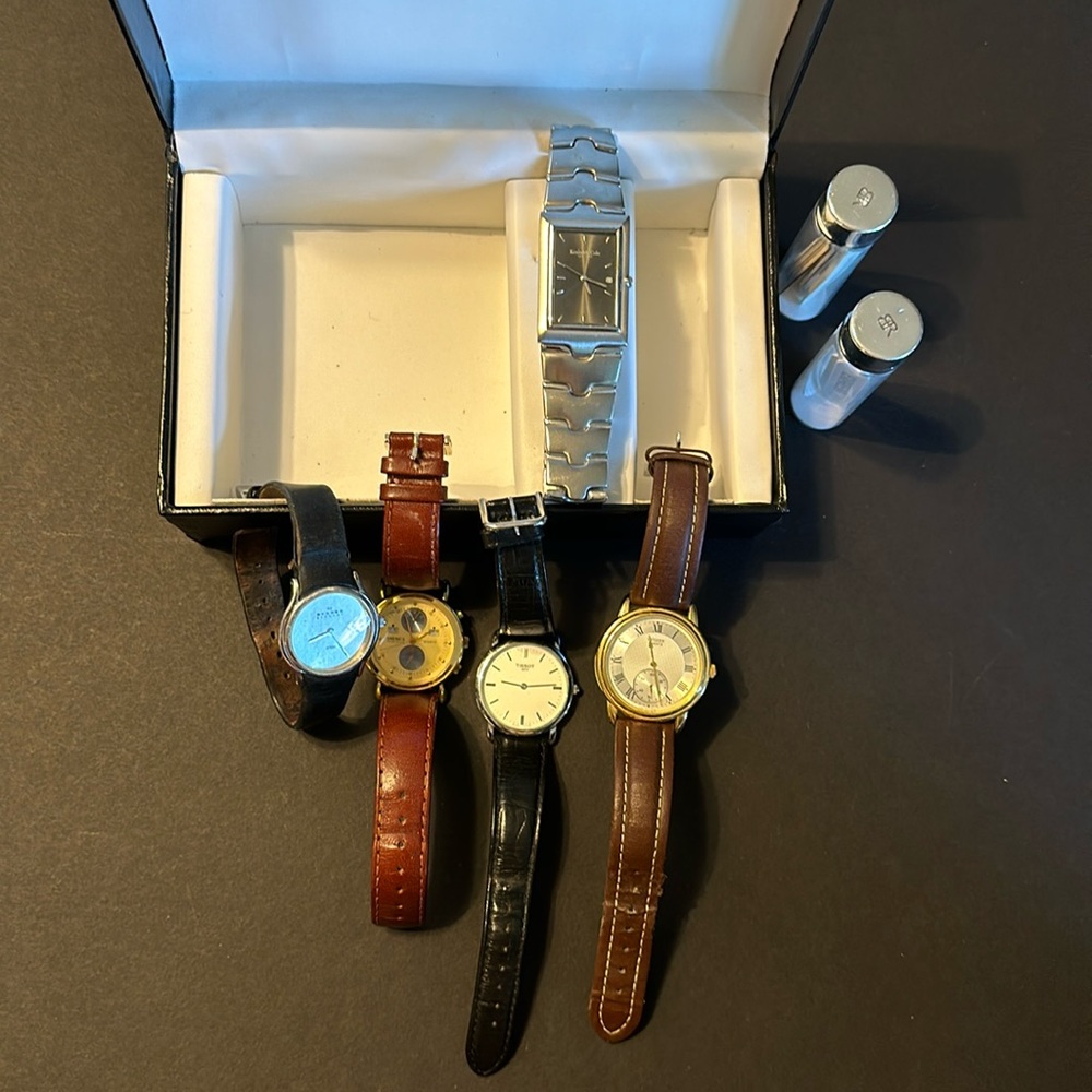 Box of used watches. Could be worth some money, but would rather get rid of them